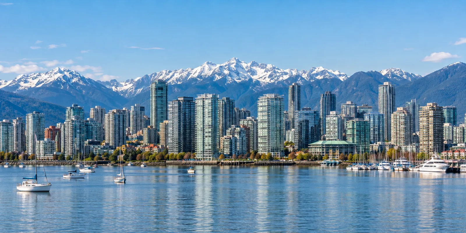 Vancouver's downtown skyline with the Coast Mountains rising directly behind it